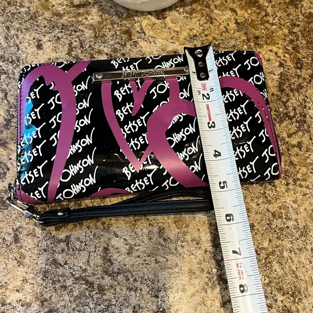 Betsey Johnson Black and Pink Wristlet with Heart Design